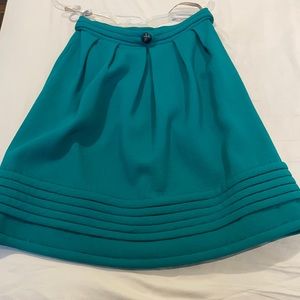 New condition! To be worn high waist w/tuck in top